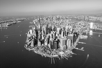 Panoramic Aerial View of Lower Manhattan with Iconic Skyline, Brooklyn Bridge, and Surrounding...