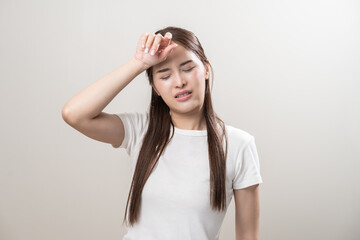 Hot weather and health care concept asian young woman suffering from heat, feeling discomfort with...