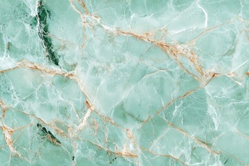 A mint-green marble surface with light veins and natural cracks. The texture is smooth and refined giving off a luxurious fresh feel