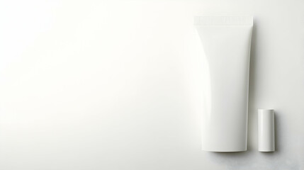 White cosmetic tube and cap on white background; product mockup for packaging design