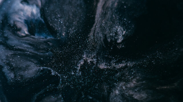Glitter blob. Grunge explosion. Liquid art shimmering gray black blue emulsion spills enamel surface marble abstract background opener.
