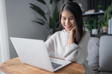 Asian Businesswoman VDO Call Conference Work  talk chat online  video call on laptop webcam conference working with laptop online briefing E learning and social distancing concept