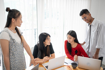 Business people group diverse colleagues team discuss project in  bright modern office Startup Diversity Teamwork Brainstorming.