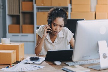Portrait of Starting small businesses SME owners female entrepreneurs working on receipt box and...