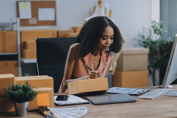 Portrait of Starting small businesses SME owners female entrepreneurs working on receipt box and...