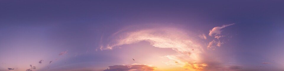 360 panorama of glowing sunset sky with bright Cirrus clouds. Seamless hdr spherical 360 panorama. Sky dome in 3D visualization, sky replacement for aerial drone panoramas. Weather and climate change