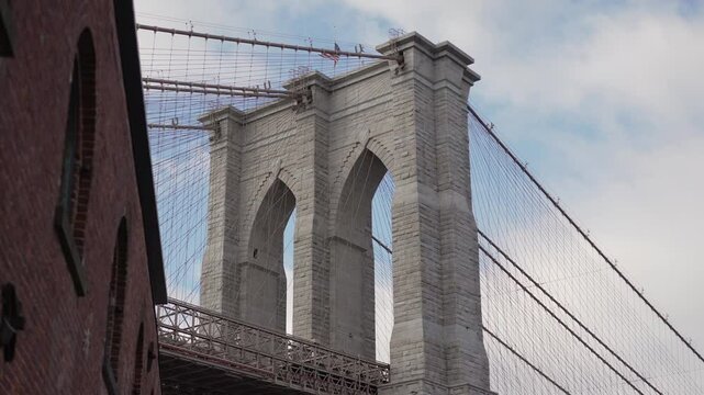 A stunning view of the Brooklyn Bridge offers a glimpse of historic architecture and culture