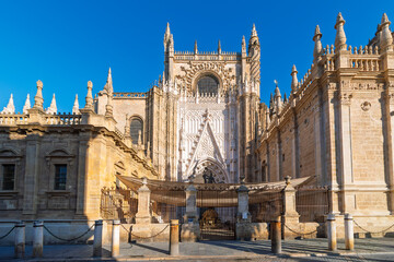 One of the entrances and small gated courtyard at the Seville Cathedral in the historic center of...