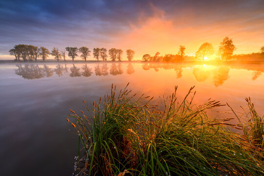 Colorful spring sunrise over the lake