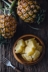 pineapple on wooden background