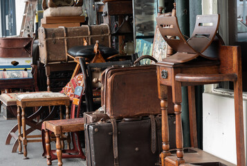 Vintage furniture and other items in a pile