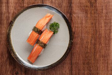 Crab Stick Kani Nigiri Sushi Served on a Plate