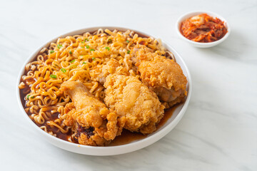 Korean instant noodles with fried chicken or Fried chicken ramyeon