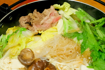 Japanese home-style “Sukiyaki” - a one-pot dish filled with beef, vegetables and mushrooms