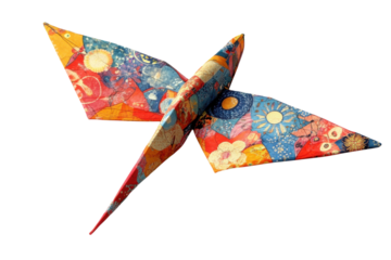 Colorful origami bird crafted with intricate patterns and vibrant hues displayed on a clean white background