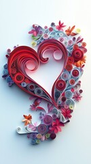 Intricate paper quilling forming heart design on clean background