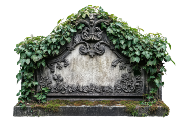 Weathered grave marker covered in ivy at a historic cemetery in autumn