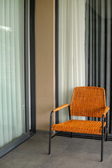 armchair in a room with a window,modern house exterior