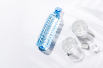 Crystal-clear glasses filled with chilled water and ice cubes
