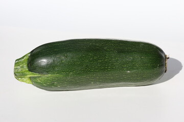 Black Beauty zucchini isolated on white background