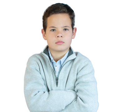 Boy wearing casual sweater with arms folded isolated on transparent background. Handsome child looking at camera. PNG transparent.