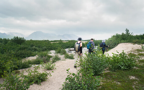 Three people hiking the Valley of Ten Thousand Smokes. Katmai National Park and Preserve. Alaska. USA.