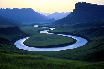 Fototapeta premium Serene Winding River Through Majestic Mountains