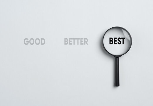 Magnifying glass focusing on the best choice among good and better options