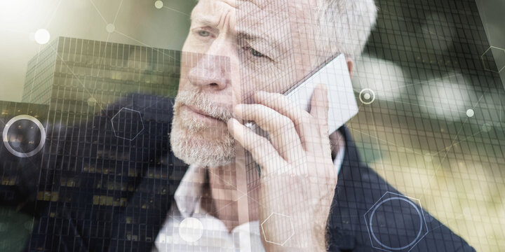 Mature man using his mobile phone, light effect, double exposure, geometric pattern - Powered by Adobe