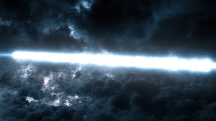 Fototapeta premium Bright beam of light through dark stormy clouds.