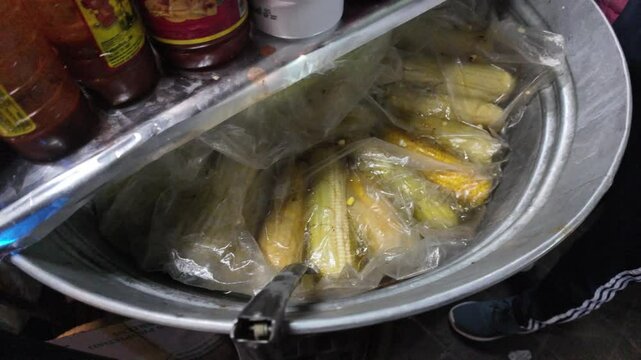Discovering the flavors of boiled corn elotes and esquites in Mexico street food scene