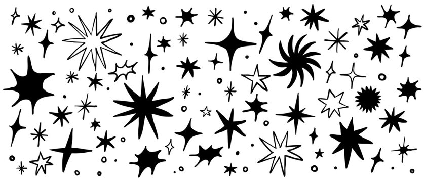 Set of hand drawn vector stars and sparkles, doodle style
