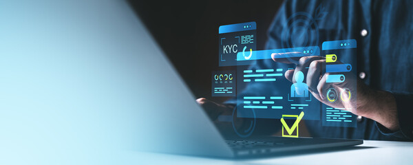 Digital KYC interface with holographic graphics and user interaction on a laptop screen.