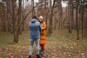 Fototapeta premium Lovebirds dancing in the park.