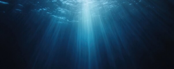Deep blue sea surface, flat, straight horizon, and deep ocean.


