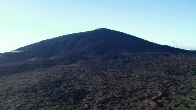 Aerial view by drone of the Piton de la Fournaise, the Dolomieu crater, the Formica L&eacute;o volcanic cone and the Chapelle de Rosemont in the Fouqu&eacute; enclosure, Reunion Island