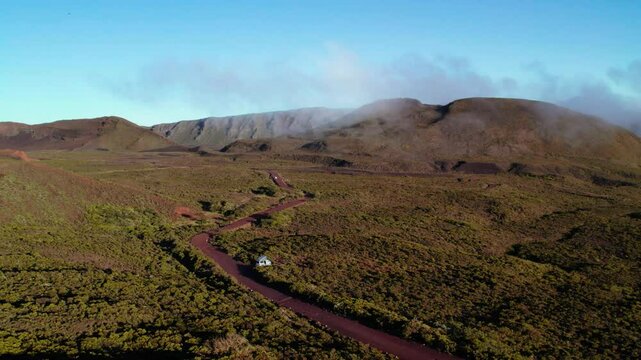 Aerial view by drone of the Piton de la Fournaise, the Dolomieu crater, the Formica L&eacute;o volcanic cone and the Chapelle de Rosemont in the Fouqu&eacute; enclosure, Reunion Island