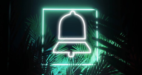Image of neon bell icon over leaves on black background