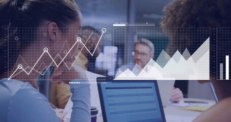 Image of financial data processing over diverse colleagues discussing work in office