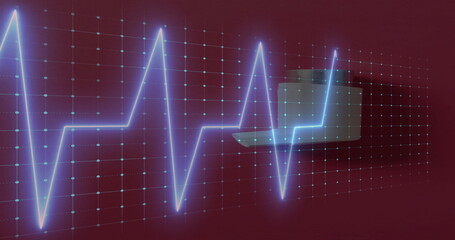 Image of cardiograph over inhaler on red background