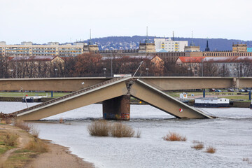 Partially collapsed Carola bridge in river