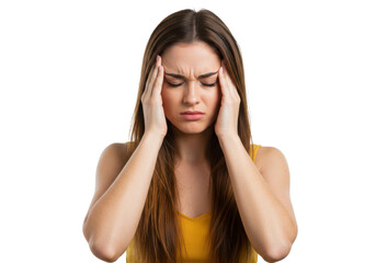 Fototapeta premium Young woman with long brown hair, holding her head with both hands, appearing stressed or in pain, wearing a sleeveless yellow top, isolated on white background