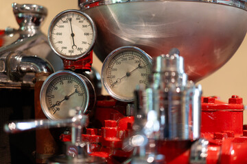 Vintage pressure gauges on industrial machine