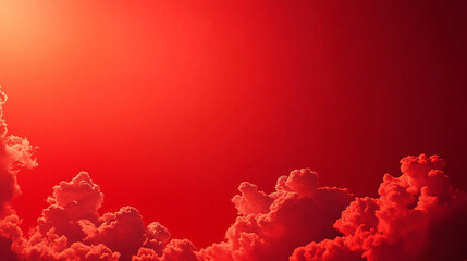 Fototapeta premium Fiery red sky with dramatic illuminated clouds creating an intense warm atmosphere with vibrant sunlight and deep colors 