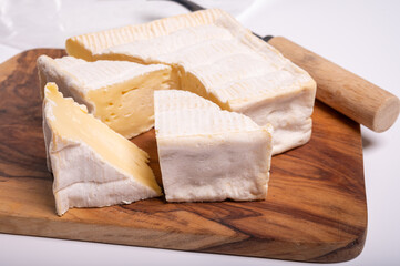 French squared pont l'eveque cow cheese from Calvados department, Normandy, France