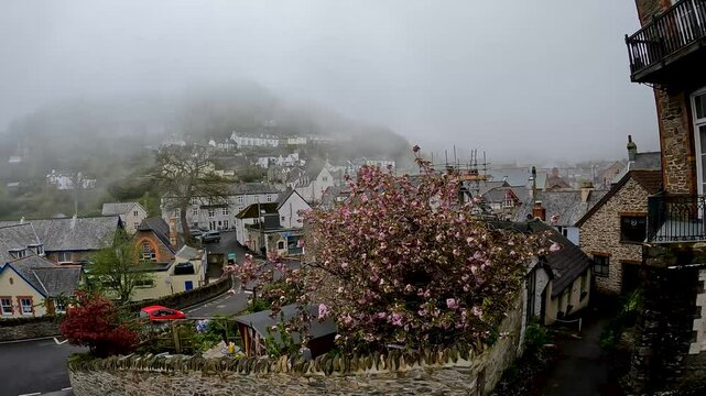 Lynmouth is a village in Devon, England, on the northern edge of Exmoor. The village straddles the confluence of the West Lyn and East Lyn rivers.