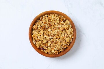 Delicious granola on a light background