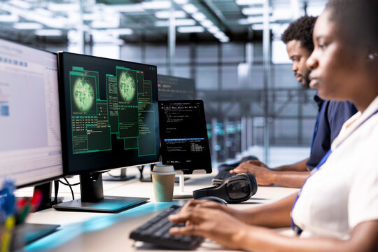 Cybersecurity specialist monitoring security incidents affecting server hub network. Programmer in data center office protecting company critical infrastructure from cyber threats