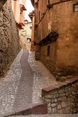Narrow street with beautiful houses in Albarracin town