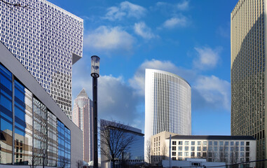 Modern skyscrapers and urban architecture in Frankfurt am Main under a bright blue sky